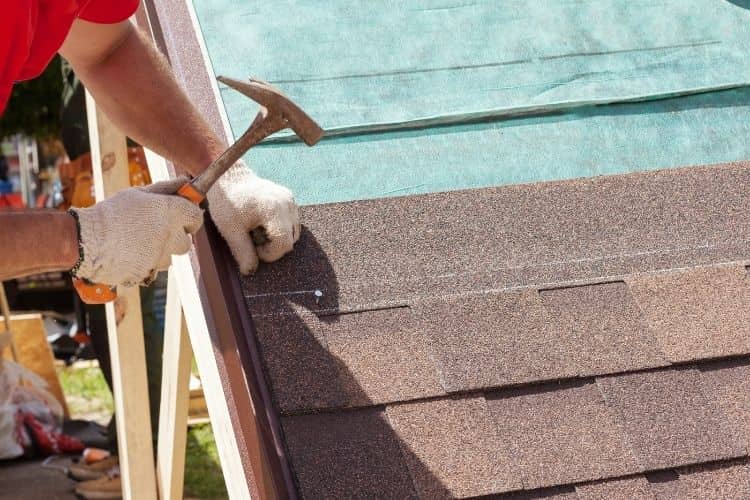 attaching roofing shingles with a hammer